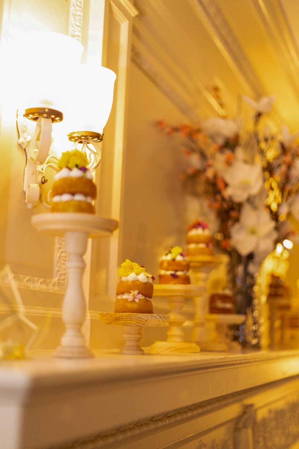 Dessert table styled on a candlelit mantel